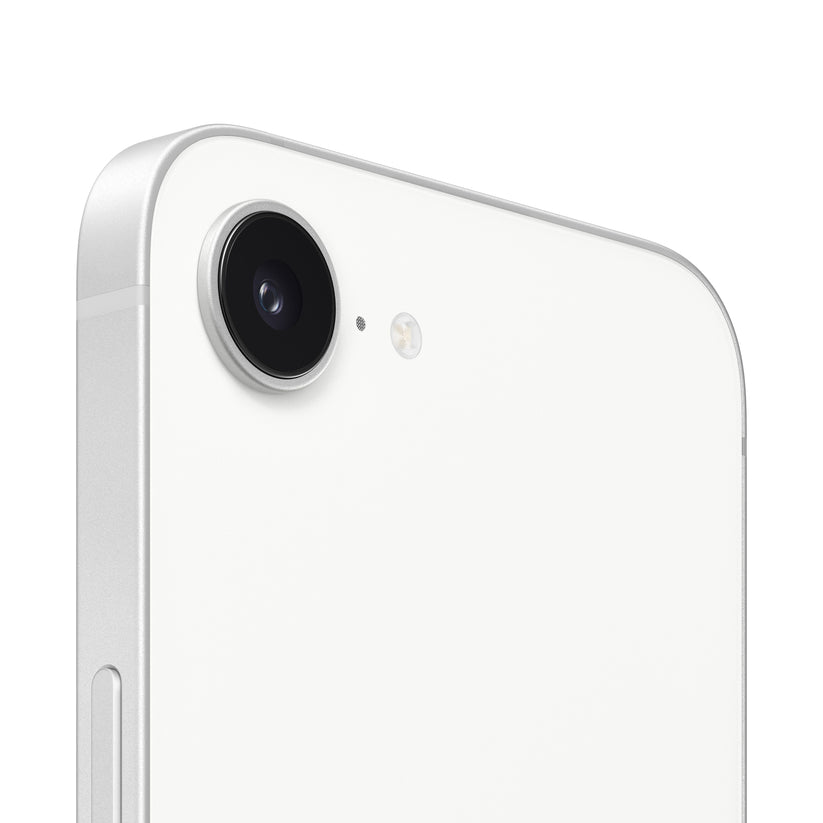 A close-up view of the white smartphone's rear camera module, highlighting the single protruding lens, a tiny microphone hole, and the adjacent circular flash ring.